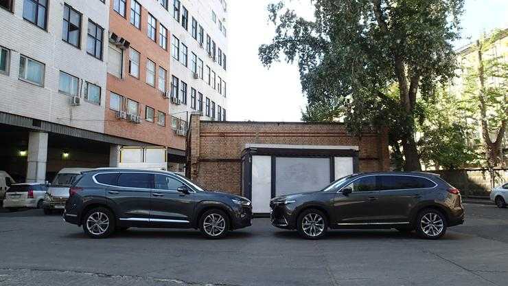 В каждом дому по кому: сравнительный тест Hyundai Santa Fe и Mazda CX-9
