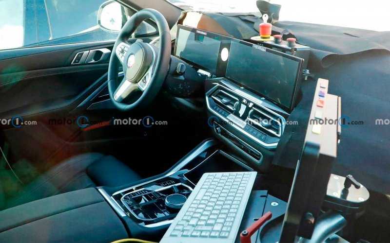 
            Обновленный BMW X6 получит салон с двумя большими дисплеями
        