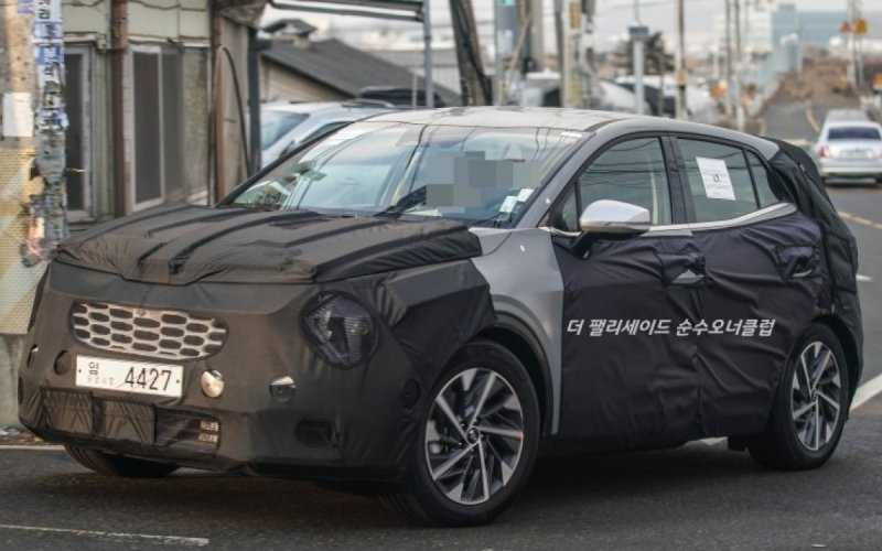 Новый Kia Sportage получит салон в стиле Sorento и измененный логотип