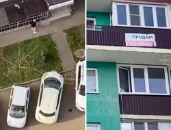 Видео: россиянин заряжает электрокар из окна 20 этажа